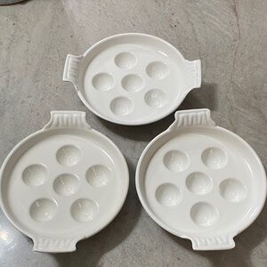 Vintage cast iron white enamel escargot pan.